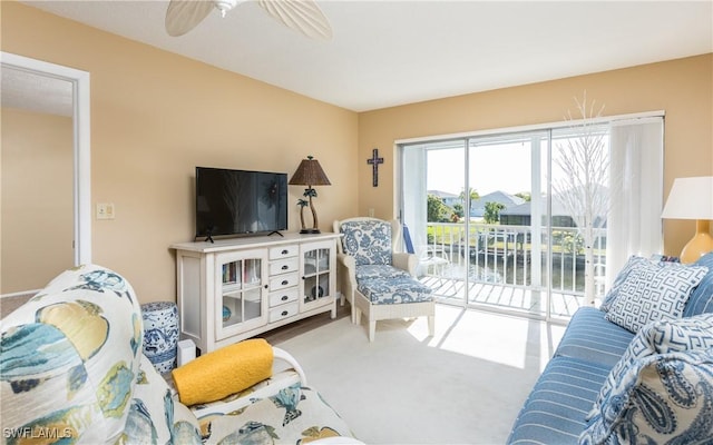 4549 SE 5th Pl Unit 211, Cape Coral, FL 33904 - living room with carpet floors and ceiling fan