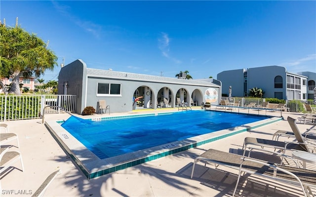 4549 SE 5th Pl Unit 211, Cape Coral, FL 33904 - community pool with a patio area