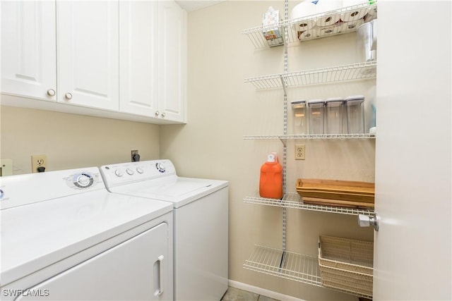 4549 SE 5th Pl Unit 211, Cape Coral, FL 33904 - laundry room with cabinet space and washer and clothes dryer
