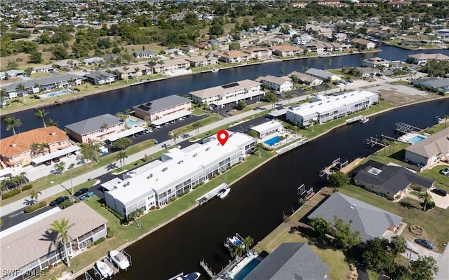 4549 SE 5th Pl Unit 211, Cape Coral, FL 33904 - aerial view of property's location featuring nearby suburban area and a large body of water