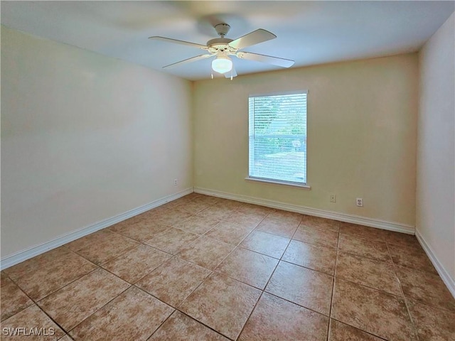 2640 4th Ave NE, Naples, FL 34120 - spare room featuring light tile patterned floors and a ceiling fan