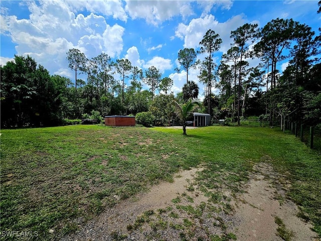 2640 4th Ave NE, Naples, FL 34120 - view of yard with a hot tub