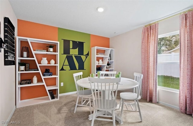 331 NW 19th St, Cape Coral, FL 33993 - carpeted dining area featuring baseboards