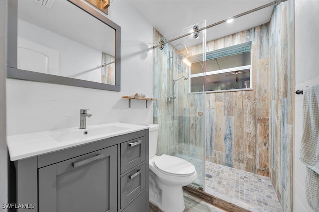 19350 Meredith Rd, North Fort Myers, FL 33917 - full bathroom with vanity, a stall shower, and wood finished floors
