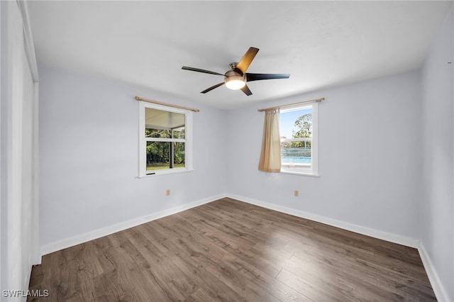 19350 Meredith Rd, North Fort Myers, FL 33917 - spare room with wood finished floors and ceiling fan