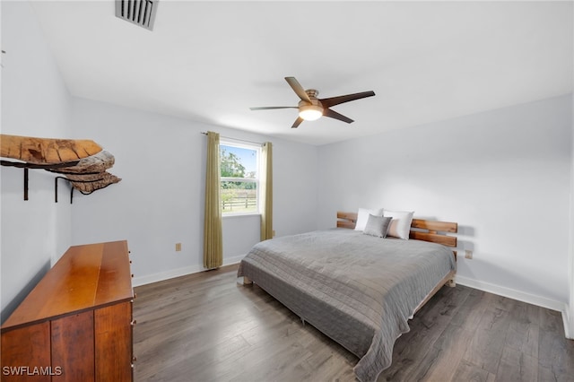 19350 Meredith Rd, North Fort Myers, FL 33917 - bedroom featuring wood finished floors and ceiling fan