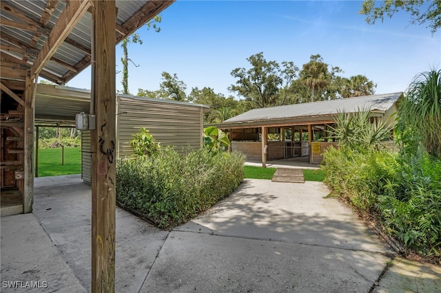 19350 Meredith Rd, North Fort Myers, FL 33917 - view of patio / terrace featuring an exterior structure and an outdoor structure