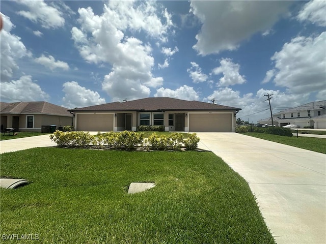 4627/4629 SW 7th Pl, Cape Coral, FL 33914 - single story home with driveway, an attached garage, and a front yard