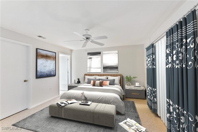642 SE 13th Pl Unit 5, Cape Coral, FL 33990 - bedroom featuring a ceiling fan and light colored carpet