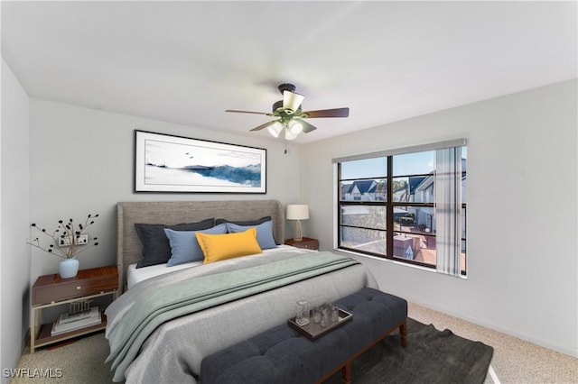 642 SE 13th Pl Unit 5, Cape Coral, FL 33990 - carpeted bedroom with ceiling fan and baseboards