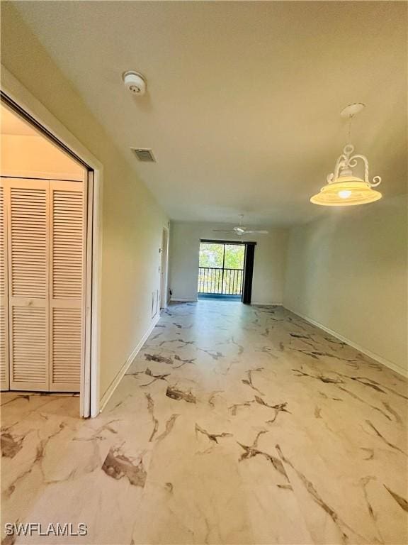 642 SE 13th Pl Unit 5, Cape Coral, FL 33990 - spare room with a smoke detector, marble finish floors, and a ceiling fan