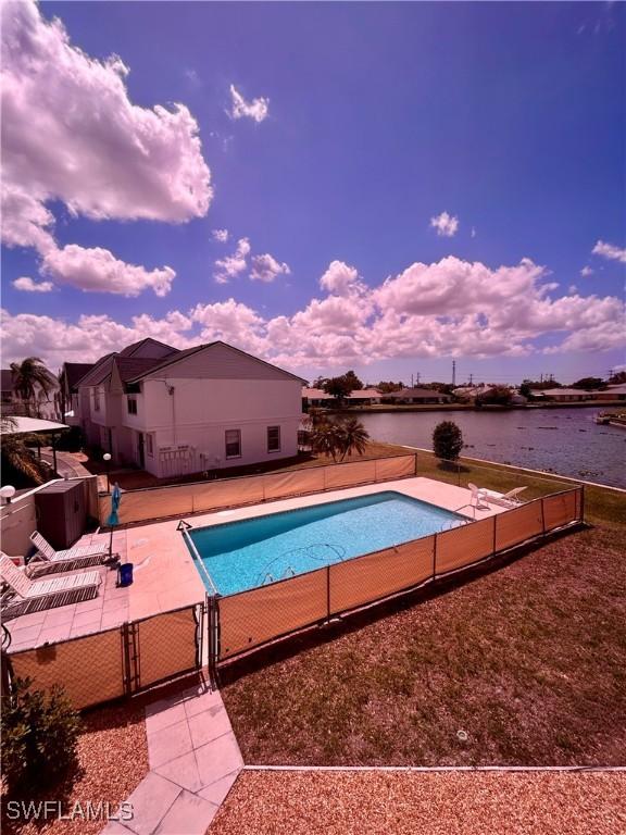 642 SE 13th Pl Unit 5, Cape Coral, FL 33990 - view of swimming pool with a gate, a water view, and a patio area