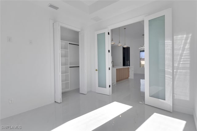 1040 NE 11th Ave, Cape Coral, FL 33909 - unfurnished bedroom with a closet and ensuite bath