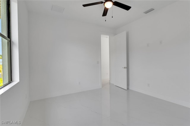 1040 NE 11th Ave, Cape Coral, FL 33909 - spare room with ceiling fan