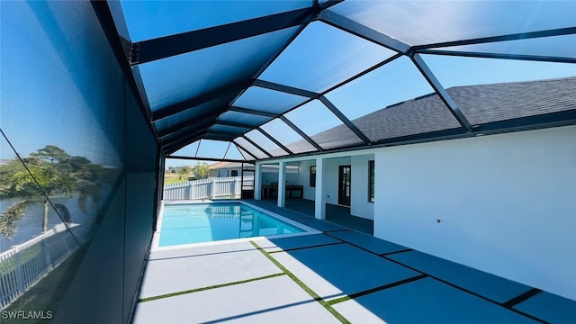 1040 NE 11th Ave, Cape Coral, FL 33909 - view of swimming pool featuring a patio and a lanai