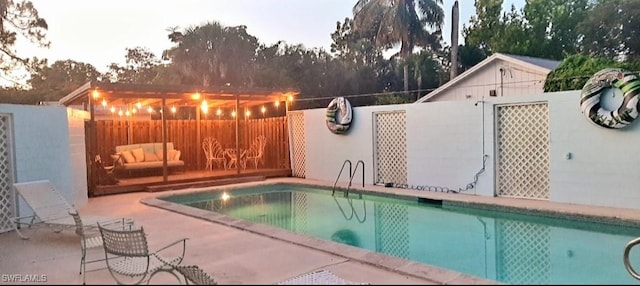 1260 26th Ave N, Naples, FL 34103 - view of pool with a patio