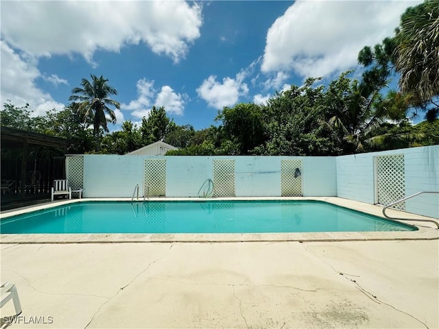 1260 26th Ave N, Naples, FL 34103 - view of pool with a patio area