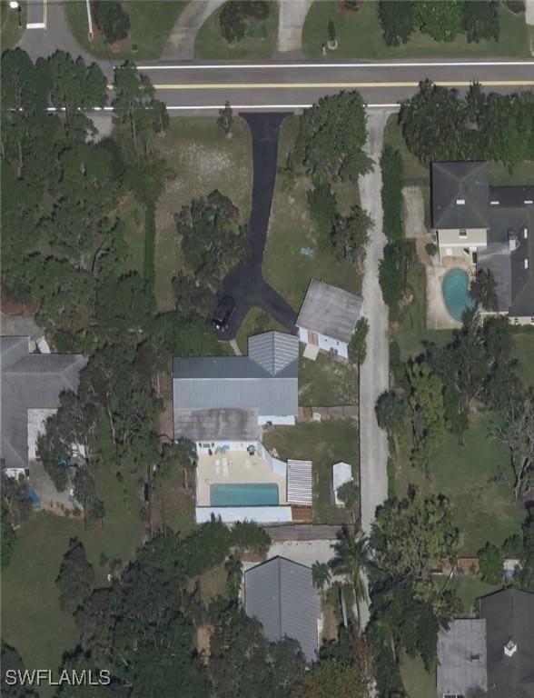 1260 26th Ave N, Naples, FL 34103 - aerial overview of property's location with a pool