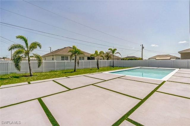 834 NW 2nd St, Cape Coral, FL 33993 - view of pool featuring a patio and a fenced backyard