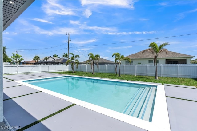 834 NW 2nd St, Cape Coral, FL 33993 - view of swimming pool featuring a patio area