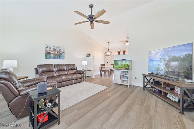 2508 Tropicana Pkwy W, Cape Coral, FL 33993 - living area featuring a ceiling fan, light wood-style floors, and lofted ceiling