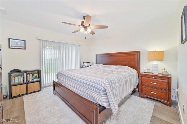 2508 Tropicana Pkwy W, Cape Coral, FL 33993 - bedroom featuring light wood finished floors, access to outside, and ceiling fan