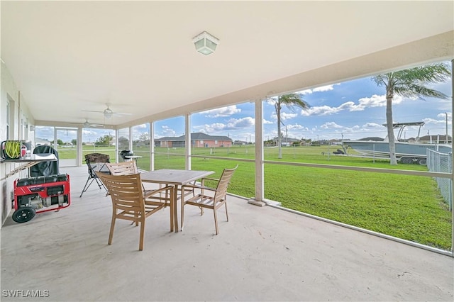 2508 Tropicana Pkwy W, Cape Coral, FL 33993 - sunroom / solarium with outdoor dining area and a ceiling fan