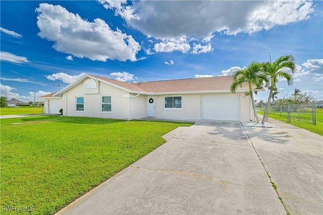 2508 Tropicana Pkwy W, Cape Coral, FL 33993 - ranch-style home featuring a garage, stucco siding, and concrete driveway