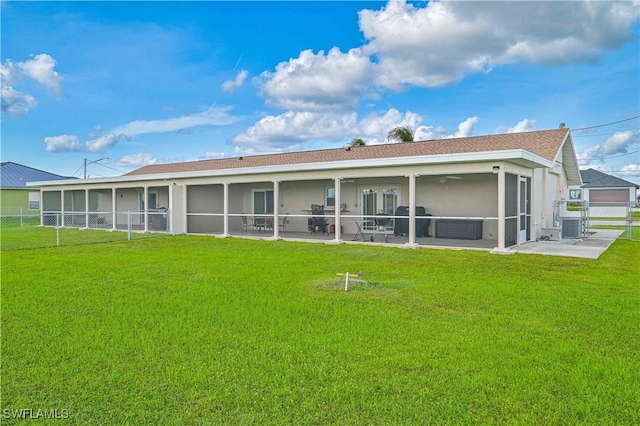 2508 Tropicana Pkwy W, Cape Coral, FL 33993 - back of property with a sunroom