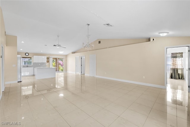 3206 8th St SW, Lehigh Acres, FL 33976 - unfurnished room with light tile patterned floors, a ceiling fan, lofted ceiling, a chandelier, and recessed lighting