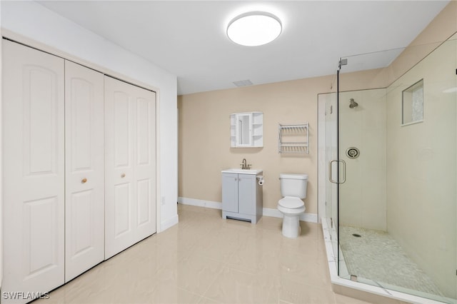 3206 8th St SW, Lehigh Acres, FL 33976 - bathroom featuring a stall shower, vanity, a closet, and tile patterned floors