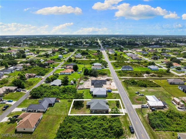 3206 8th St SW, Lehigh Acres, FL 33976 - aerial view of residential area featuring property boundaries highlighted