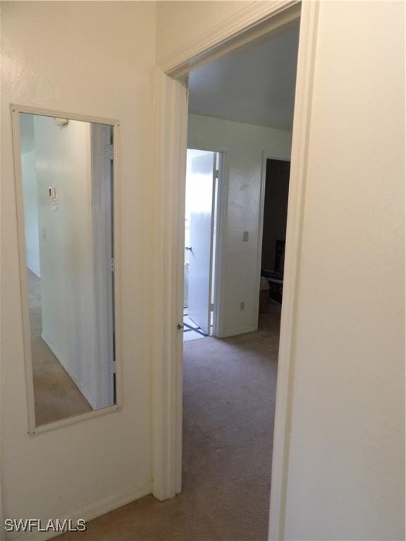 4807 6th St W, Lehigh Acres, FL 33971 - corridor with carpet flooring