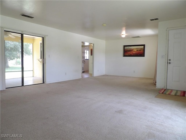 4807 6th St W, Lehigh Acres, FL 33971 - unfurnished room featuring light colored carpet
