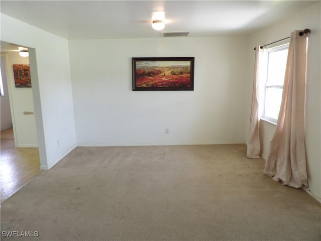 4807 6th St W, Lehigh Acres, FL 33971 - empty room with light colored carpet and baseboards