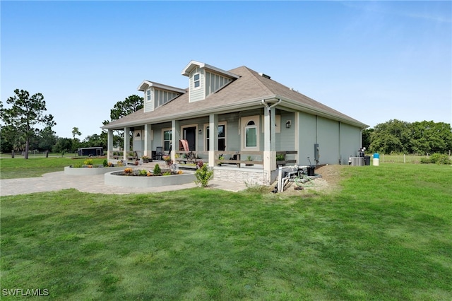 9785 Wheeler Rd, Labelle, FL 33935 - view of front of home featuring covered porch and a front yard