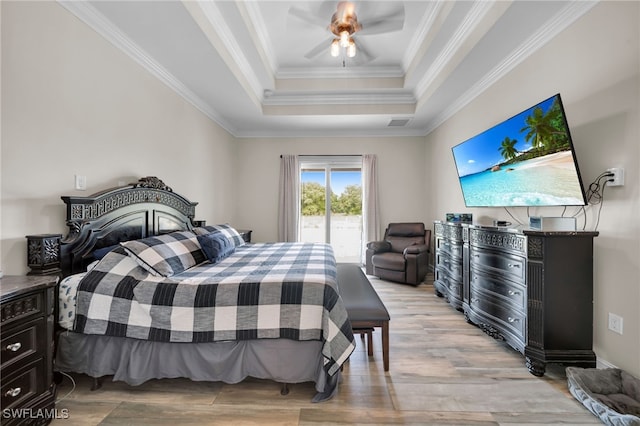 9785 Wheeler Rd, Labelle, FL 33935 - bedroom with a tray ceiling, light wood-style floors, crown molding, access to exterior, and ceiling fan