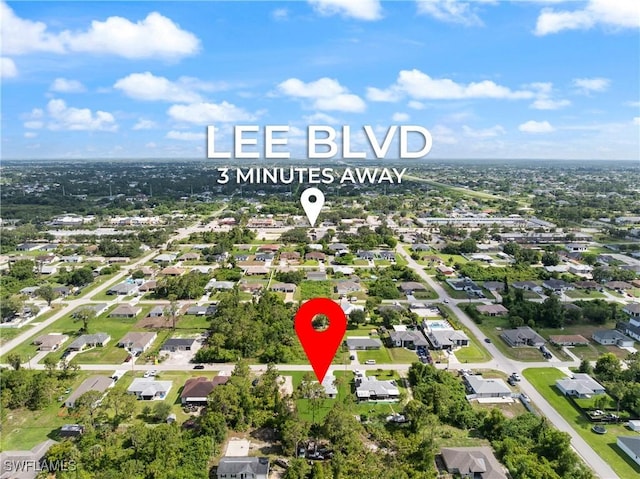 2912 8th St W, Lehigh Acres, FL 33971 - aerial view of property and surrounding area featuring nearby suburban area
