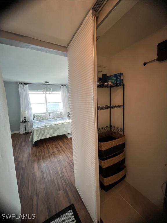 1900 Clifford St Unit 606, Fort Myers, FL 33901 - bedroom with wood finished floors