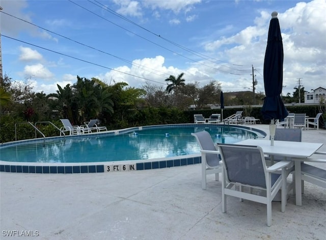 1900 Clifford St Unit 606, Fort Myers, FL 33901 - community pool featuring a patio