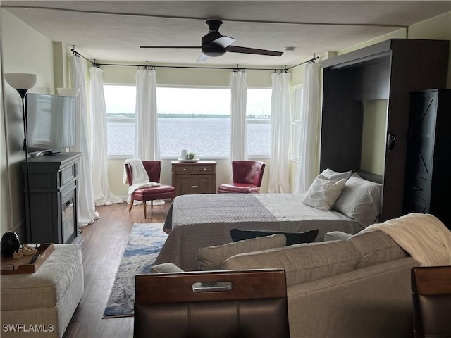 1900 Clifford St Unit 606, Fort Myers, FL 33901 - bedroom with wood finished floors and a water view