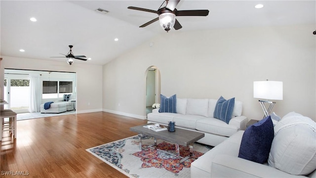 27978 Carl Cir, Bonita Springs, FL 34135 - living room featuring a ceiling fan, wood finished floors, lofted ceiling, and recessed lighting