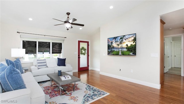 27978 Carl Cir, Bonita Springs, FL 34135 - living area with wood finished floors, ceiling fan, and recessed lighting