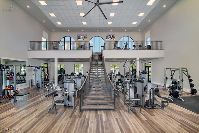19545 Utopia Ln, Estero, FL 33928 - workout area with a high ceiling, wood finished floors, and a drop ceiling
