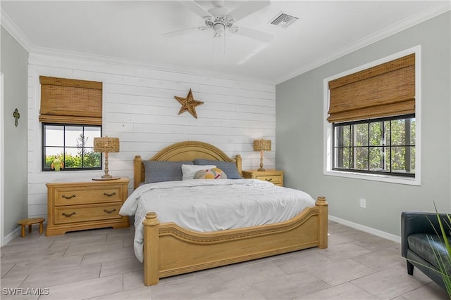 19545 Utopia Ln, Estero, FL 33928 - bedroom with crown molding, a ceiling fan, and wood walls