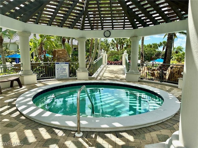 9053 Cascada Way Unit 202, Naples, FL 34114 - view of swimming pool with a pergola and a swimming pool