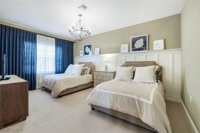 9053 Cascada Way Unit 202, Naples, FL 34114 - bedroom featuring light carpet and a chandelier