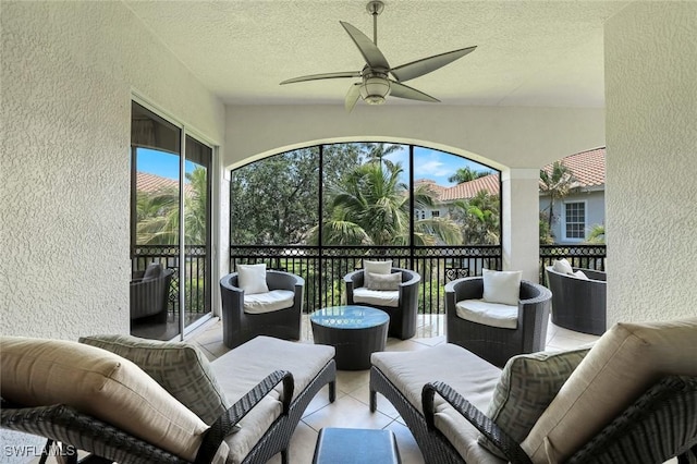 9053 Cascada Way Unit 202, Naples, FL 34114 - sunroom / solarium featuring ceiling fan and an outdoor hangout area