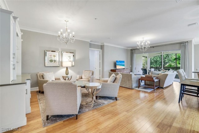 9053 Cascada Way Unit 202, Naples, FL 34114 - living area with a chandelier, light wood-style flooring, and crown molding
