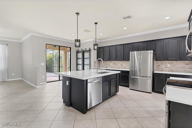 2738 Via Piazza Loop, Fort Myers, FL 33905 - kitchen with stainless steel appliances, tasteful backsplash, light tile patterned floors, light countertops, and recessed lighting